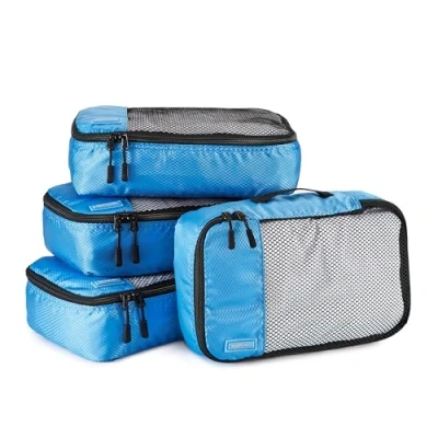 Immagine di Amazon Basics Organizer da Viaggio Salvaspazio per Valigie, con Cerniera, Set 4 Pezzi, Piccolo, Blu Cielo