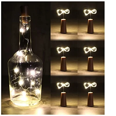 Immagine di com four® 6x Luci per Bottiglia a LED Lucine in Sughero Interni, Bottiglie di Vino e Champagne Vuote Mini con Funzionamento Batteria (06 pezzi)
