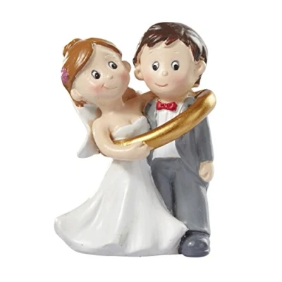 Immagine di Coppia di sposi in un anello Statuetta per la torta nuziale Decorazione tavola