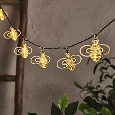 Immagine di Lights4fun Catena Luminosa di 10 Api Dorate con LED Bianchi Caldi a Pile per Arredo Esterni