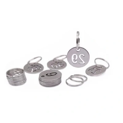 Immagine di NanTun Targhette numerate in acciaio inox, 23 mm, 30 pezzi, con anelli per numeri da 1 a
