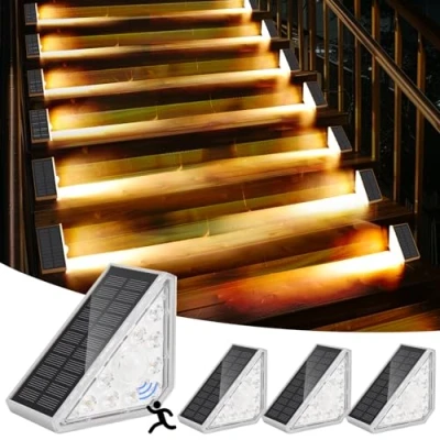 Immagine di GuKKK Lampade Solari per Esterni, 4 PCS 3000K Scale con Sensore di Movimento, IP67 Impermeabile LED Solare Lampada da Scala, Cortile, Patio, Prato, Gradini(Bianco Caldo)