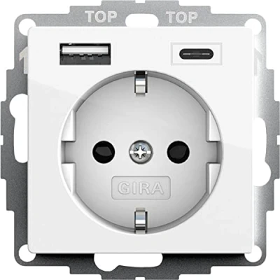 Immagine di Gira 245903 presa Schuko con porta USB, protezione da contatto, 2 prese tipo A (max.2,4 A), C (max.3 A, sistema 55, bianco puro, lucido, parete per smartphone, tablet, 32 mm