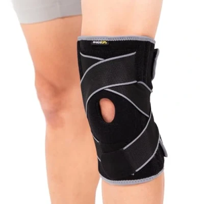 Immagine di BraceUP Tutore ginocchio con Stabilizzatori laterali e tamponi in gel per la rotula Supporto definitivo il contro dolore, artrite stabilizzazione della (S/M)