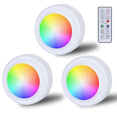 Immagine di Faretto LED RGB alimentato a batteria con telecomando, 16 colori che cambiano colore, illuminazione per armadio, dimmerabile, senza fili, timer e funzione memoria, cuscinetti adesivi