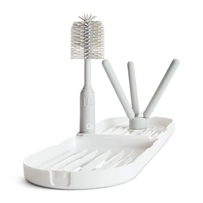 Immagine di Munchkin Travel Drying Rack with Bottle Brush Dry up to 3 Baby Bottles at Once Includes Extendable Silicone Nipple in Hand Essentials