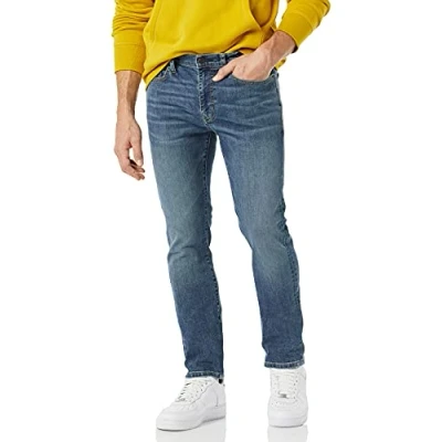 Immagine di Amazon Essentials Jeans elasticizzati a vita alta vestibilità attillata Uomo, Delavé Medio, 40W / 29L
