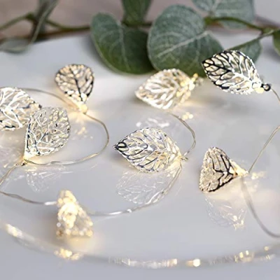 Immagine di Lights4fun Catena Luminosa Decorativa di 20 Foglie Filigrana Argento con Micro LED Bianchi Caldi a Pile per Interni