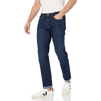Immagine di Amazon Essentials Jeans Elasticizzati a Vita Alta vestibilità Aderente Uomo, delavé Scuro, 32W / 32L