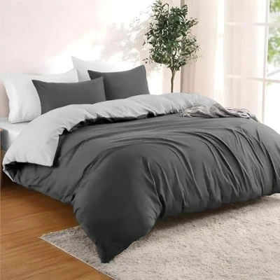 Immagine di Dreamzie Una Piazza e Mezza 155x220 cm con 2 Federe 80x80 Grigio Scuro/Grigio Chiaro Set Copripiumino