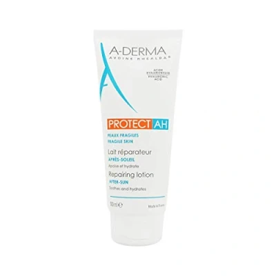 Immagine di A Derma Protect AH Latte Ristrutturante Doposole 100 ml Lenisce idrata e rinforza la pelle fragile dopo l&#039;esposizione