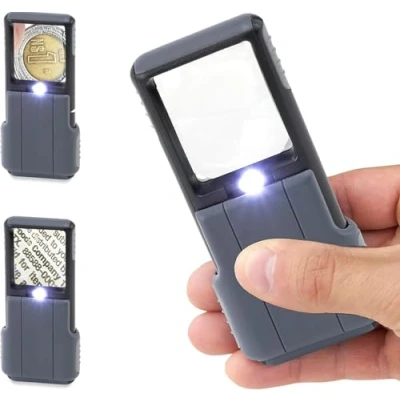 Immagine di Carson MiniBrite 5x Lente d&#039;ingrandimento tascabile con luce LED integrata e custodia scorrevole