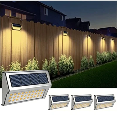 Immagine di luci solari per recinzione, decorative a LED, in acciaio inox, da giardino, impermeabili, wireless, scale, pareti, patio, cortile, confezione 4 (30 LED bianco caldo)