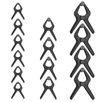 Immagine di Amazon Basics confezione da 14 morsetti a molla in nylon: 6 unità 8,57 cm, 4 11,43 16,51 Nero/ Grigio