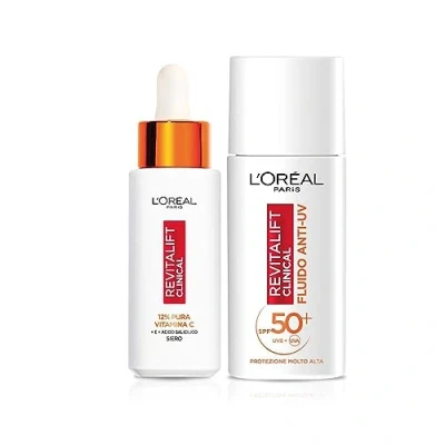 Immagine di L&#039;Oréal Paris Routine Illuminante e Protettiva, Con Siero 12% Pura Vitamina C Fluido SPF 50+, Acido Salicilico, Revitalift Clinical, 30 ml + 50