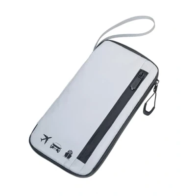 Immagine di Custodia per i documenti di viaggio REFLACTIVE TRAVELLER con cerniere impermeabili e cinghia da mano, altamente riflettente tasca frontale adatta smartph. o passaporto 11 scomparti interni