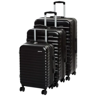 Immagine di Amazon Basics Trolley rigidi Set da 3 Pezzi con rotelle girevoli, 55, 68, 78 cm, Nero