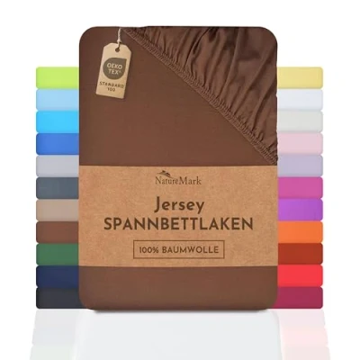 Immagine di NatureMark Lenzuolo con angoli elasticizzati in jersey, 100% cotone, molti colori e misure, conforme all’Oeko Tex Standard 100, 120 x 200 cm, Marrone cioccolato