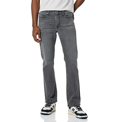 Immagine di Amazon Essentials Jeans Slim t con Taglio Bootcut Uomo, Grigio Slavato, 32W / 29L
