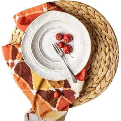 Immagine di Dudoplatz Set di 8 tovagliette rotonde da 35 cm, realizzate a mano, in giacinto d&#039;acqua, intrecciate alta qualità, resistenti al calore e antiscivolo, naturali (giacinto