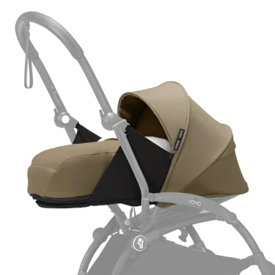 Immagine di Stokke YOYO 0+ Newborn Pack, Toffee Include materasso, capottina estendibile e allacciatura a 5 punti Richiede telaio (venduto separatamente)