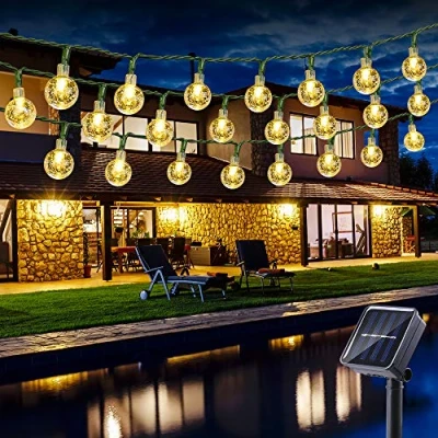 Immagine di Catena Luminosa Esterno Solare, BrizLabs 6.5M 30 LED Cristallo Luce Stringa Impermeabile illuminazione 8 Modalità per Giardino, Portico, Albero, Matrimonio, Festa, Albero di Natale (Bianco Caldo)