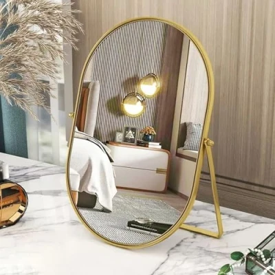 Immagine di Gosider Specchio da tavolo ovale dorato, telaio in metallo, portatile, orientabile su un lato, con supporto per vanità, comò, soggiorno, camera letto, ufficio