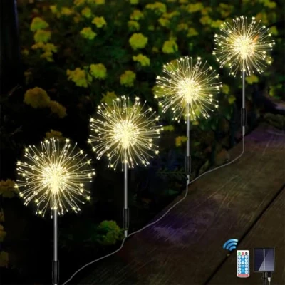Immagine di Joysing Luci Solari Esterno 4 Pezzi 120LED Lusine da Fuochi d&#039;artificio com Telecomando, 8 Modalità Lucine Impermeabili Decorazioni Giardino per Prato Cortile Patio Bianco Caldo