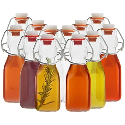 Immagine di Kurtzy 12pz Bottiglia Vetro con Tappo a Clip Ermetico Bottigliette 100 ml Bottiglie di per Acqua Chiusura Scatto Liquori, Bevande ed Olio