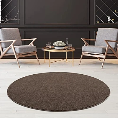 Immagine di Fashion4Home Tappeto a pelo corto in tinta unita per salotto, cameretta dei bambini, camera da letto, studio, ufficio, corridoio e cucina, colore: rosa, dimensioni: 80 cm, rotondo