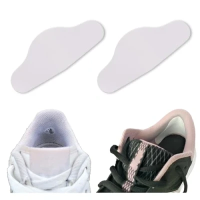 Immagine di Trainer Armour Tallone antiforatura per scarpe e stivali. Toppe bianche autoadesive stile &quot;Wrap Around&quot;. estremamente forti impediscono riparano i fori del tallone.