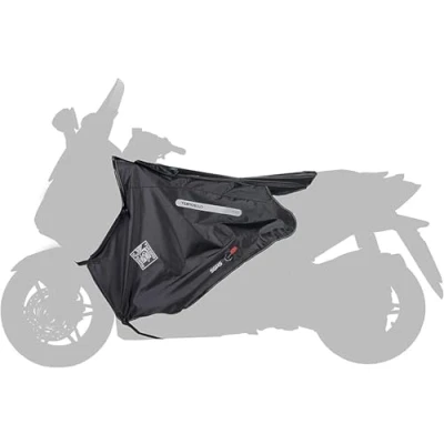 Immagine di Tucano Urbano coprigambe per scooter Termoscud® R062W. L&#039;originale termoscudo con brevetto anti sventolio S.G.A.S. Costruzione triplo strato HYDROSCUD a tenuta stagna. Termico. Certificato CE