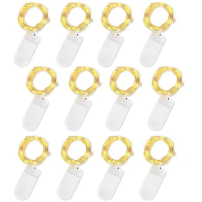 Immagine di Jsdoin Stringa Luci LED a Batteria, 12 Pezzi Impermeabile 20 2M Mini Lampada Fili di Rame Bianco Caldo, per Interni ed Esterni, Natalizi, Matrimoni, Feste Compleanno, Decorazione da Giardino