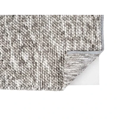 Immagine di WENKO Tappetino antiscivolo di qualità robusta da tagliare individualmente, adatto per diversi tipi pavimento come laminato o ceramica e riscaldamento a pavimento, (L x P): 70 140 cm, bianco