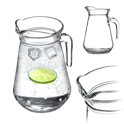 Immagine di KADAX brocca in vetro, vetro robusto da 1,3 l, con beccuccio e manico maneggevole, caraffa per bevande fredde, succhi di frutta, latte, tè freddo, trasparente (Teddy)