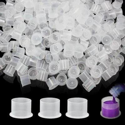 Immagine di &quot;Emalla&quot; 1000 Pezzi Piccoli Tappi per Inchiostro Tazze Tatuaggi USA e Getta con Base Pigmenti in Plastica Trasparente Contenitore Trucco Permanente Inchiost