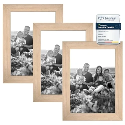 Immagine di CABBEL Set di 3 cornici DIN A5 15x21 cm in MDF con vetro acrilico infrangibile colore naturale.