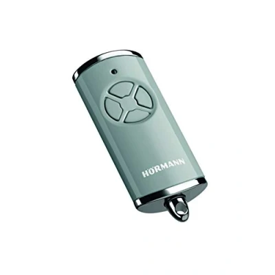 Immagine di Hörmann HSE 4 BS (frequenza 868 MHz, Grigio Lucido, azionamento per Porta del Garage con Tappi cromati, batterie Incluse, Dimensioni 28 x 70 14 mm, incl. Anello Portachiavi) 4511577