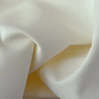 Immagine di Tessuto di cotone tinta unita crema 100% puro altezza: 155 cm (1 metro), a metro / metraggio