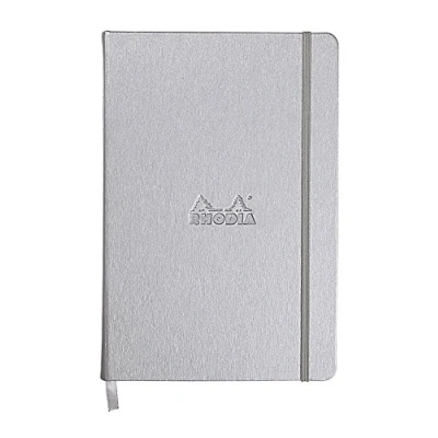 Immagine di RHODIA 118607C Taccuino Rigido Webnotebook Argento A5 A righe 192 pagine Carta Clairefontaine Avorio 90 g/m Segna pagina, Chiusura con elastico Copertina Simil Cuoio