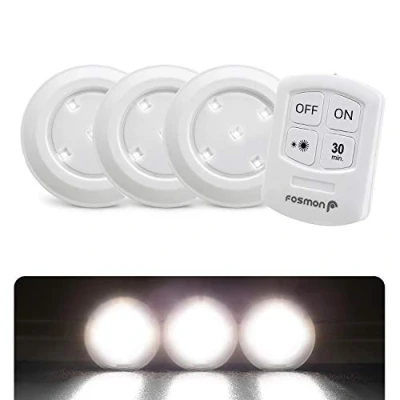 Immagine di Fosmon luce Wireless Adesiva con Telecomando a Batteria (3 pezzi) 5 LED Bianche Lampada timer da 30min illuminazione dell&#039;armadio, sotto i mobili, camera, cucina, garage, bagno ...