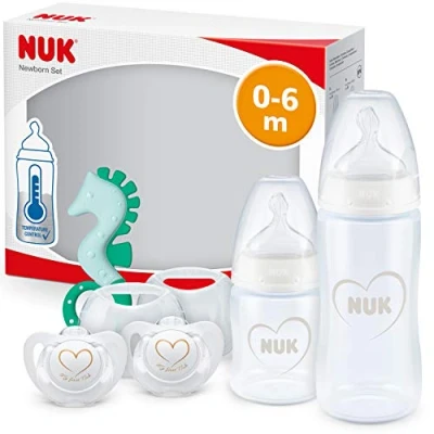 Immagine di NUK First Choice+ set biberon per neonati 0 6 mesi 2 bottiglie con controllo della temperatura, ciucci e anello di dentizione Valvola anti coliche Senza BPA cuore (neutro) 5 pezzi