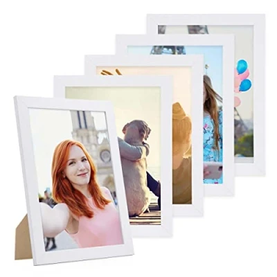 Immagine di PHOTOLINI cornici A4 21x30 cm bianco legno MDF, set di 5 larghe, moderne, plexiglass infrangibile, da tavolo o parete, accessori extra per una parete dal look raffinato