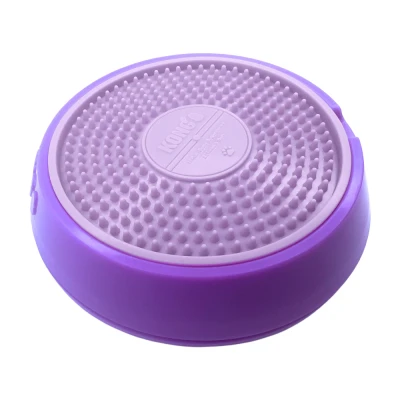 Immagine di Gioco per cani KONG Licks Spinz viola, taglia S: circa Ø 15,2 x H 3,8 cm