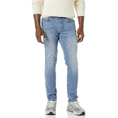 Immagine di Amazon Essentials Jeans Elasticizzati a Vita Alta vestibilità Attillata Uomo, delavé Chiaro, 30W / 34L