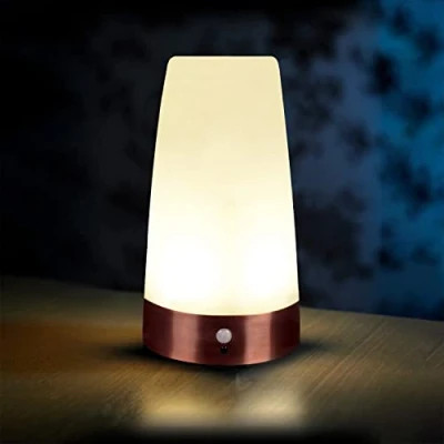 Immagine di Auraglow Lampada da tavolo wireless con sensore di movimento PIR, super luminosa, ricaricabile a LED, luce notturna per corridoio, rotonda, confezione 1