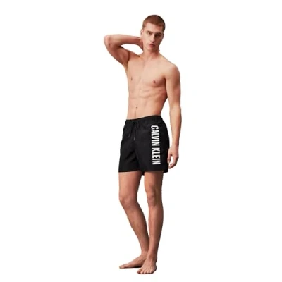 Immagine di Calvin Klein Pantaloncino da Bagno Uomo Medium Drawstring Lunghezza Media, Nero (Pvh Black), L