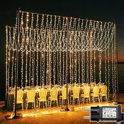 Immagine di Joycome Tenda Luminosa 600 LED Luci Natale Esterno Cascata, 6x3m Impermeabilità IP65 con 8 Modalità, Addobbi Natalizi per Matrimoni, Feste, Giardino, Interni, Murali Bianco Caldo
