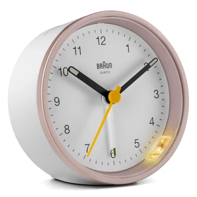 Immagine di Braun Classic Analogue Alarm Clock With Snooze And Light, Quiet Quartz Movement, Crescendo Beep Pink/White BC12PW
