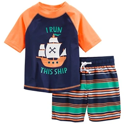 Immagine di Simple Joys by Carter&#039;s Swimsuit Trunk And Rashguard Set Rash Guard, Bianco Righe/Blu Marino Arancione Navi, 12 Mesi Bimbo